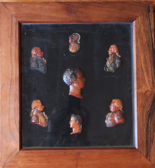 Frame with seven wax historical profil portrait