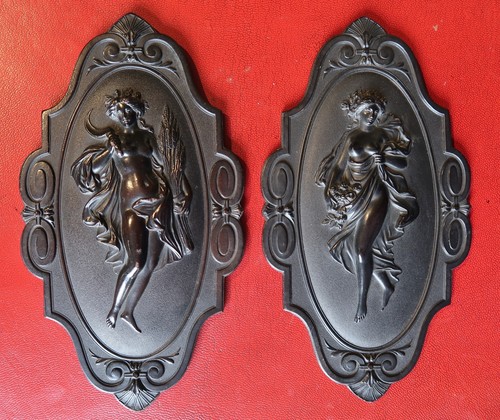 Pair of pressed wood low reliefs