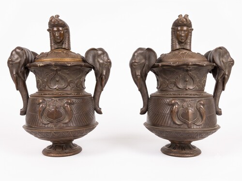 Pair of covered urns forming cigar holders, in the style of the return from Egypt
